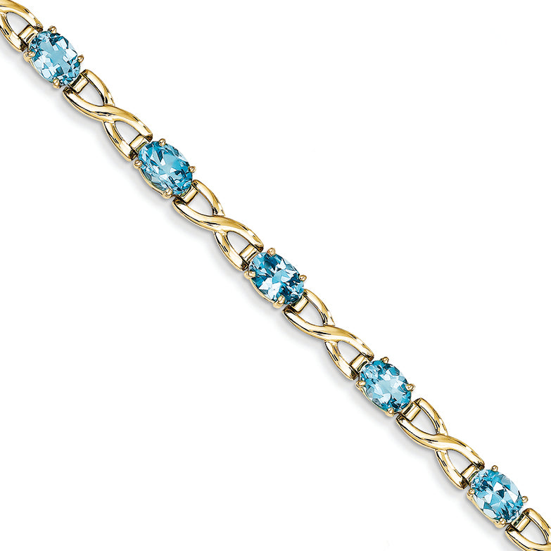 10.5 Carat 14K Gold 7x5mm Oval Blue Topaz bracelet